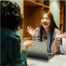 UX designer participating in a Practice Round mock interview session with expert panelist providing career guidance