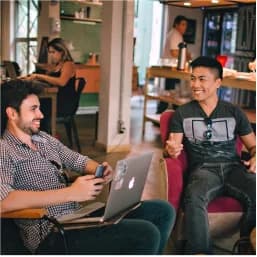 UI designer community member practicing design interview skills with experienced mentor in supportive environment